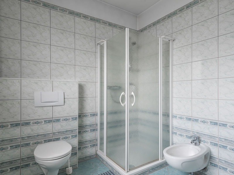Common bathroom with a shower and a toilet in a shared house Luxembourg