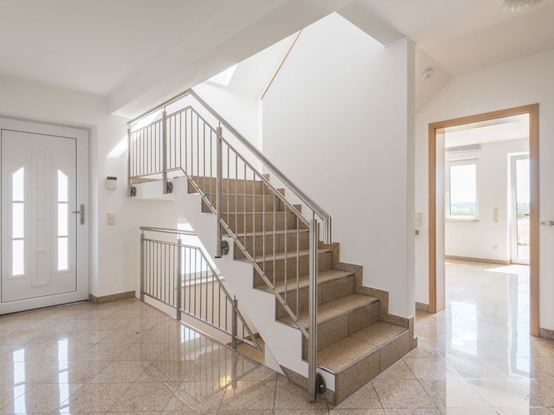 Entrance hall with staircase in a flatshare in Luxembourg city