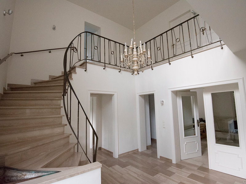 Luxembourg Roommate house entrance hall with a beautiful staircase