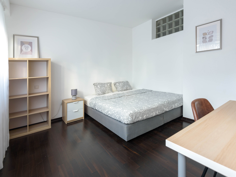 furnished room rent luxembourg with double bed, shelf, bedside table, desk