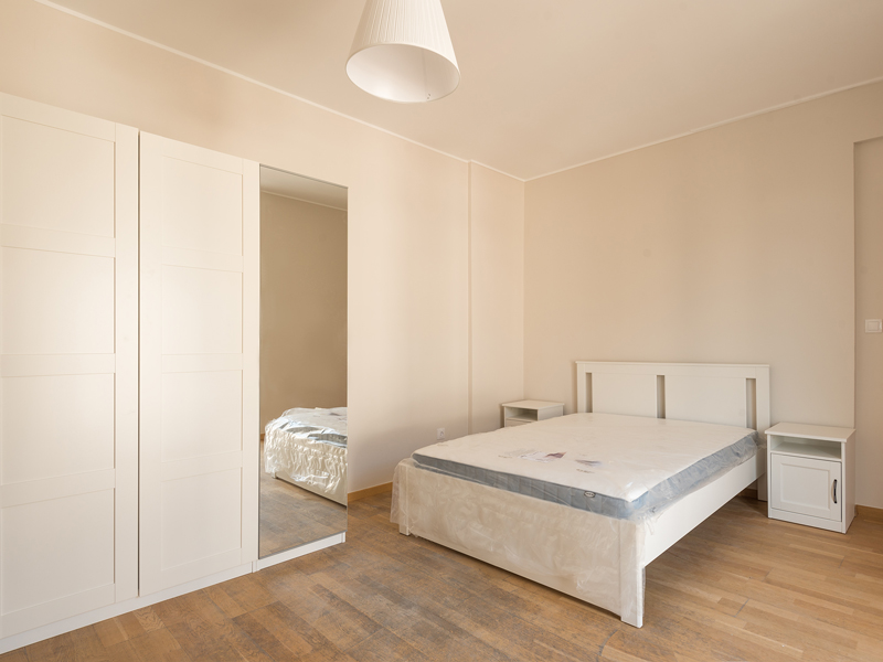 furnished room rent Luxembourg with a double bed, wardrobe