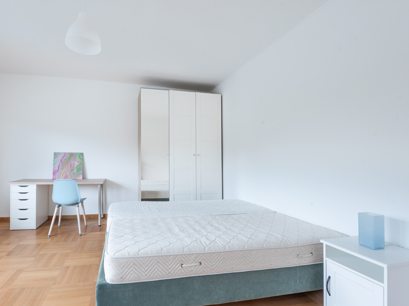 Furnished room rent Luxembourg with a double bed, big wardrobe, desk, bedside table
