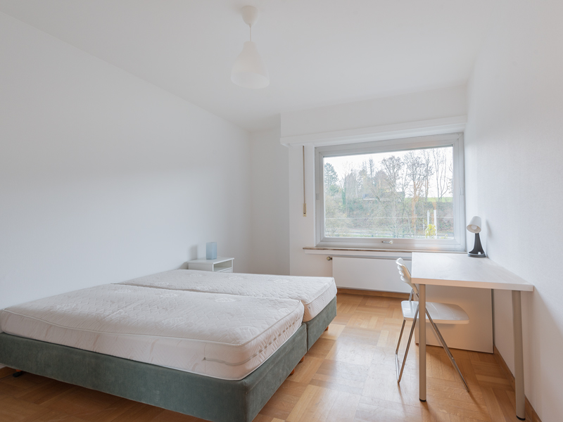 Furnished Room Rent Luxembourg. It includes double bed, big wardrobe, desk, chair.