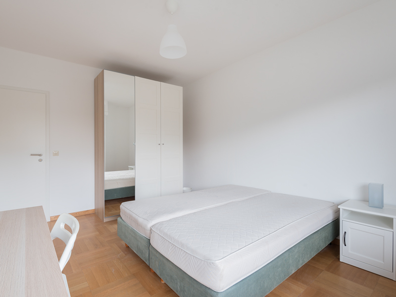 Furnished Room Rent Luxembourg. It includes double bed, big wardrobe, desk, chair.