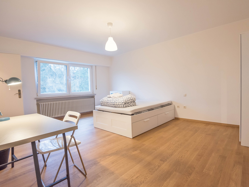 Big furnished room for rent in Luxembourg. The room includes double bed, big window, desk and a chair.